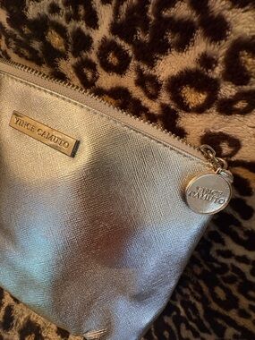 Vince Camuto Shimmery Silver Cosmetic Pouch with Logo Charm